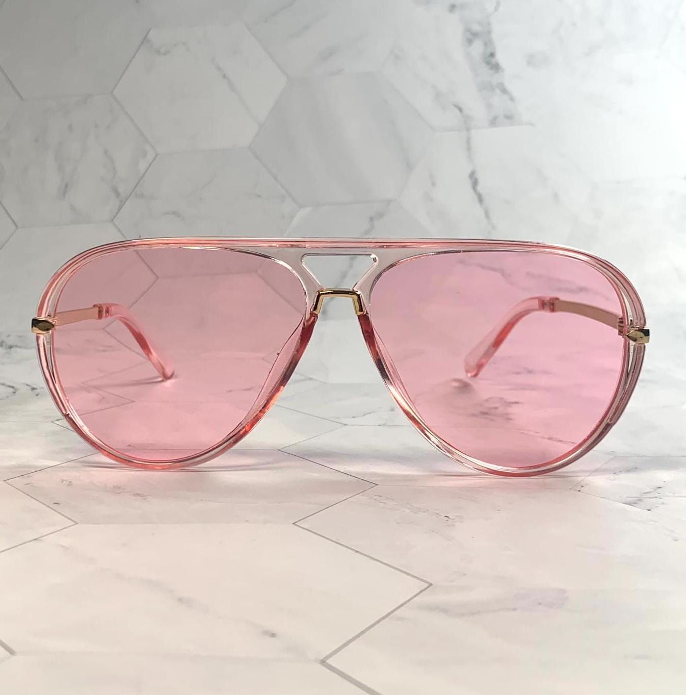 Fashionable pink frame gold-decorated sunglasses